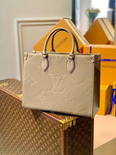 louis vuitton beige tote|louis vuitton snakeskin bag.